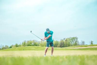 Chris playing golf